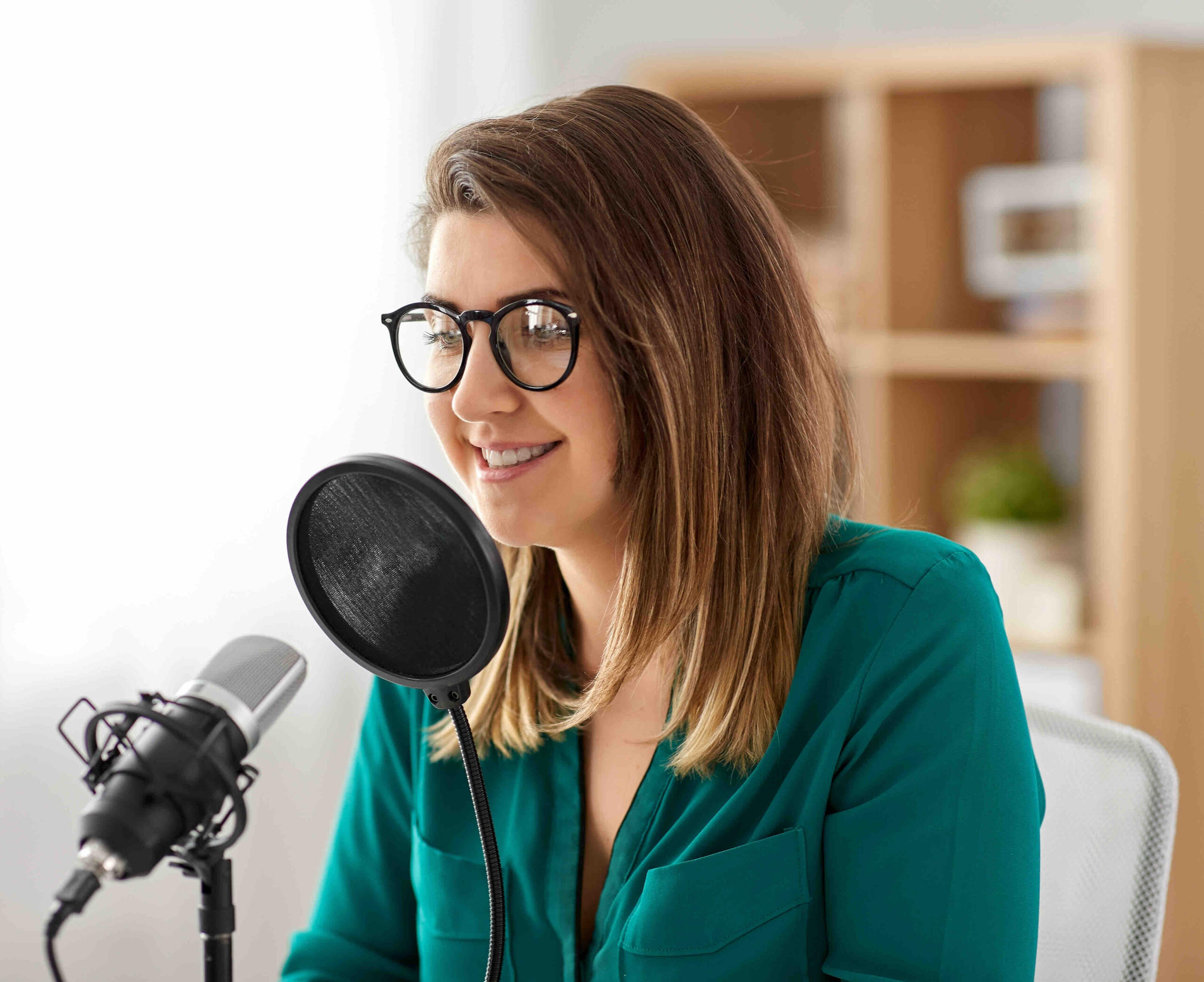 Girl recording a podcast